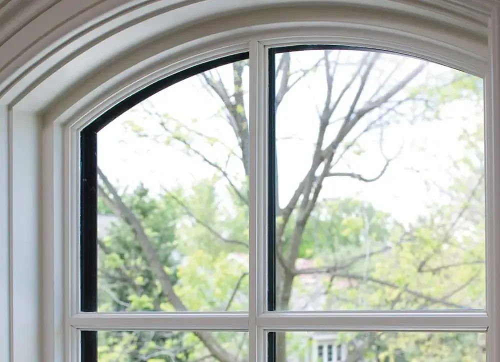 Curved Specialty Shaped Windows with white trim.
